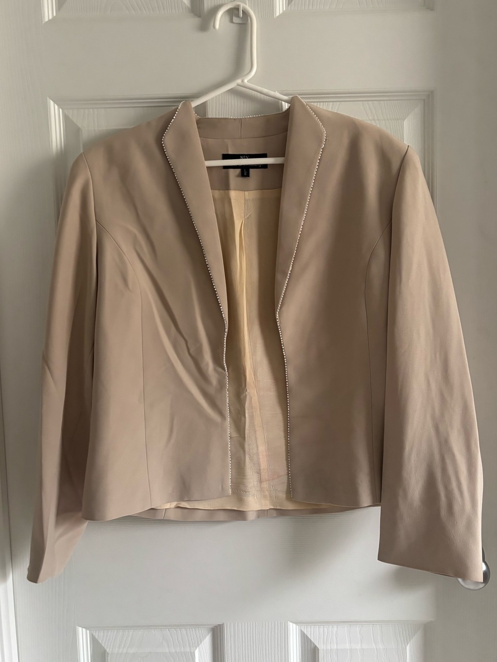 Neutral Blazer with Subtle beaded Trim and clasp to close at front